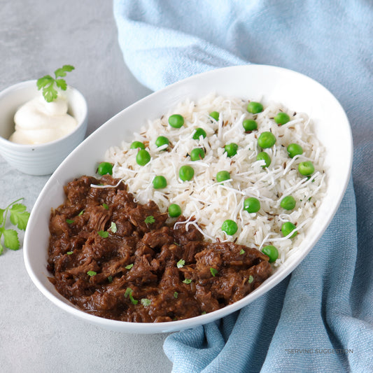 NZ lamb in a rich sauce crafted from yoghurt, spice blend, onions, garlic, & ginger. Includes cumin basmati rice, green peas & shredded coconut. Buy online now on the SwoleFoods Online Shop Website.